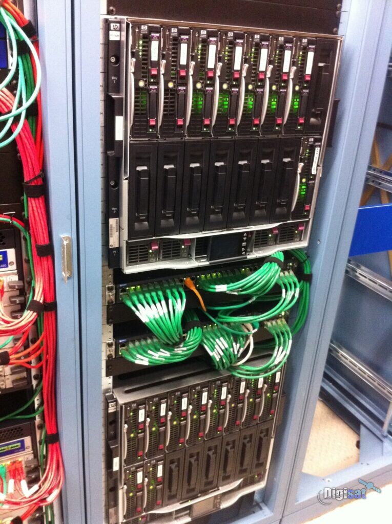 Mobile SATCOM network equipment rack with neatly dressed cabling